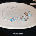 Silver Blue Butterfly Slider Bracelet and Flower Hoop Earrings view 2