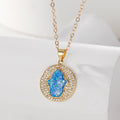 Gold Tone Blue Opal Effect Evil Eye and Hamsa Pendant Necklaces view 9