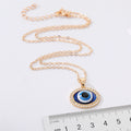 Gold Tone Oval Crystal Halo Blue Evil Eye Pendant Necklace view 2