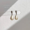 Silver Tone Teardrop Stud White Pearl Drop Earrings view 1