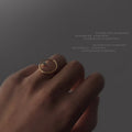 Gold Open Geometric Oval Ring With Tiny Teal Stone view 2