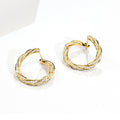 Twisted Clear Crystal Pavé Hoop Earrings in Gold Tone view 5