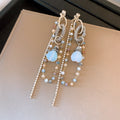 Blue Crystal Chain Tassel Earrings In Two Silver Tone Styles view 6