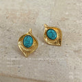 Gold Tone Hammered Leaf Stud Earrings Turquoise Cabochon view 4