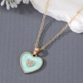 Gold Tone Crystal Enamel Heart Pendant Necklaces in Two Colors view 2