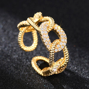 Gold Tone Textured Open Knot Rings with Clear Crystal Pave