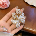 White Pearl and Crystal Cluster Statement Stud Earrings view 6