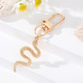 Gold Tone Sculpted Snake and Cobra Shape Clip Keychains view 6