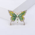 Enamel Butterfly Brooch With Polished Metal And Sculpted Decorative Details view 2