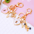 Mixed Jeweled Lock Clover Flower Butterfly and Rose Keychains in Forty One Styles view 2