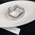 Wide Polished Wave Hinged Bangle In Gold Or Silver Tone view 6