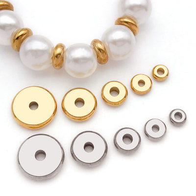 Metallic bead beads arranged on a light background