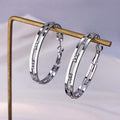 Geometric Large Hoop Earrings in Gold and Silver Tones view 2