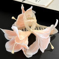Oversized Lily Flower Hair Claw In Champagne Pink Purple Or Blue view 6