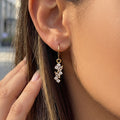 Crystal Leaf Cluster Hoop Earrings in Gold and Silver Tone view 3