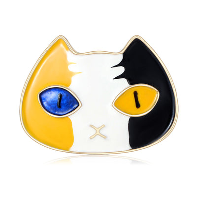 Calico enamel cat face brooch blue and yellow eyes front
