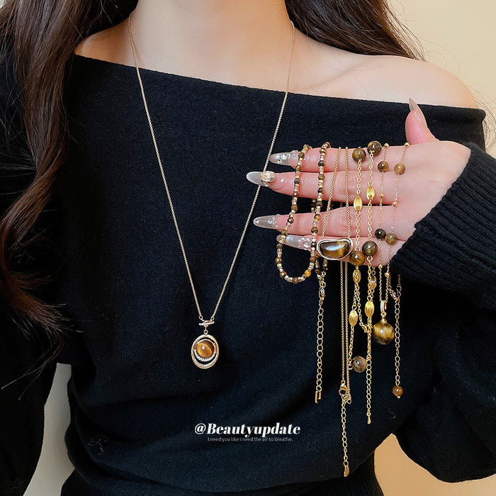 Brown Stone Style Pendant Necklaces in Four Distinct Designs