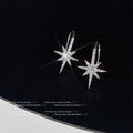 Silver Tone Clear Stone Eight Point Starburst Long Hoop Earrings view 3