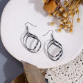 Gold Silver and Gunmetal Twisted Ribbon Drop Earrings view 3