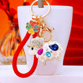 White Crystal Sheep Keychains With Nine Pictured Wrist Strap Options view 1