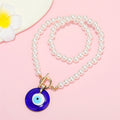 Faux Pearl Blue Evil Eye Pendant Necklace with Gold Tone Clasp view 2