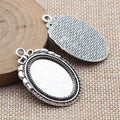 Oval 18 x 25 mm Cabochon Pendant Settings in Two Finishes view 2