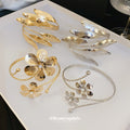Mixed Floral And Leaf Open Arm Cuffs In Gold Tone Or Silver Tone view 2