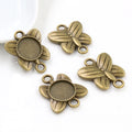 Butterfly Double Loop Round Bezel Connector Metal Trays view 2