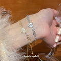 Silver Heart CZ Pull Adjustable Bracelet Shell Center view 1