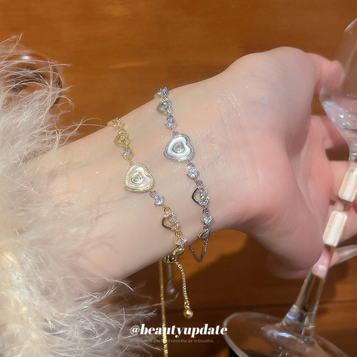Silver Heart CZ Pull Adjustable Bracelet Shell Center