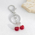 Cherry Pendant Keychain With Faux Pearl And Metal Leaf Charm view 8