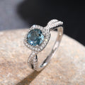 Silver Tone Teal Halo Twist Band Clear Crystal Ring view 3