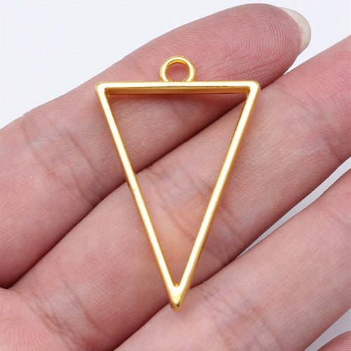 Open Inverted Triangle Resin Frame Charms hand-held front view