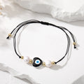 Cord and Pearl Accent Heart Evil Eye Bracelets in Nine Colors view 12