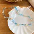 Blue and White Beaded Starfish and Shell Charm Necklace view 6