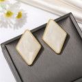 Gold Tone Faceted Diamond Shape Resin Stud Earrings in Four Colors view 9