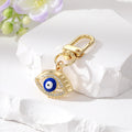Gold Tone Crystal Halo Enamel Evil Eye Clip Keychains in Five Colors view 2