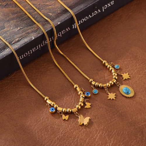 Two gold bead charm necklaces butterfly and turquoise star on leather