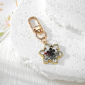 Snowflake Resin Dried Flower Keychains Gold Clasp Four Styles view 3