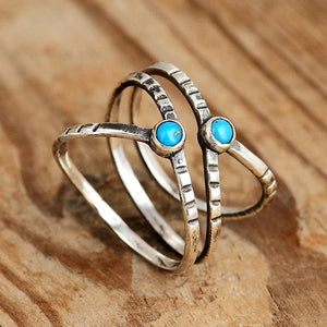 Silver-Tone Crisscross Band Ring with Two Round Turquoise-Color Stones