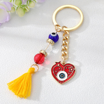 Gold Tone Red Evil Eye Heart Bead and Tassel Keychains