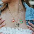 Apple Slice And Ladybug Pendant Necklaces In Gold Tone Metal view 3