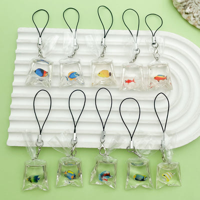 Image 1 showing a white tray with six clear bags of small glass beads.