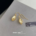 Gold Textured Oval Bean Drop Hook Earrings Matching Pair view 3
