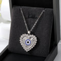 Gold and Silver Tone Fan Heart and Burst Evil Eye Necklaces view 4