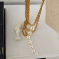 Layered Gold Tone Chain Necklace With Graduated Pearl Tassel view 4