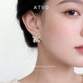 Gold Tone Iridescent Lavender Flower Clear Stone Stud Earrings view 2