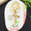 Blossom Bee Butterfly Shell and Bell Flower Keychains view 7