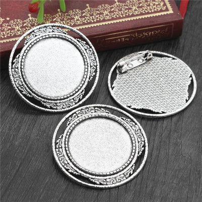 Front view of ornate round brooch bezel blank finish options
