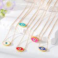 Gold Tone Open Lash Enamel Evil Eye Pendant Necklaces view 1